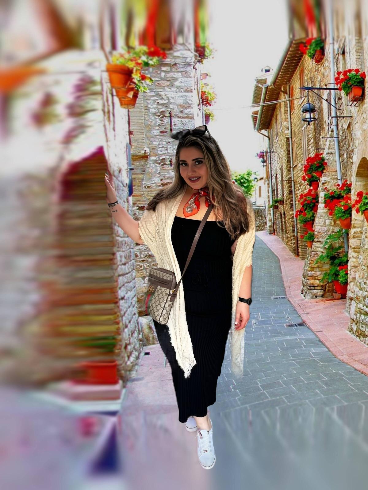 Francesca, owner of Beauty By Francesca, styling hair at her salon