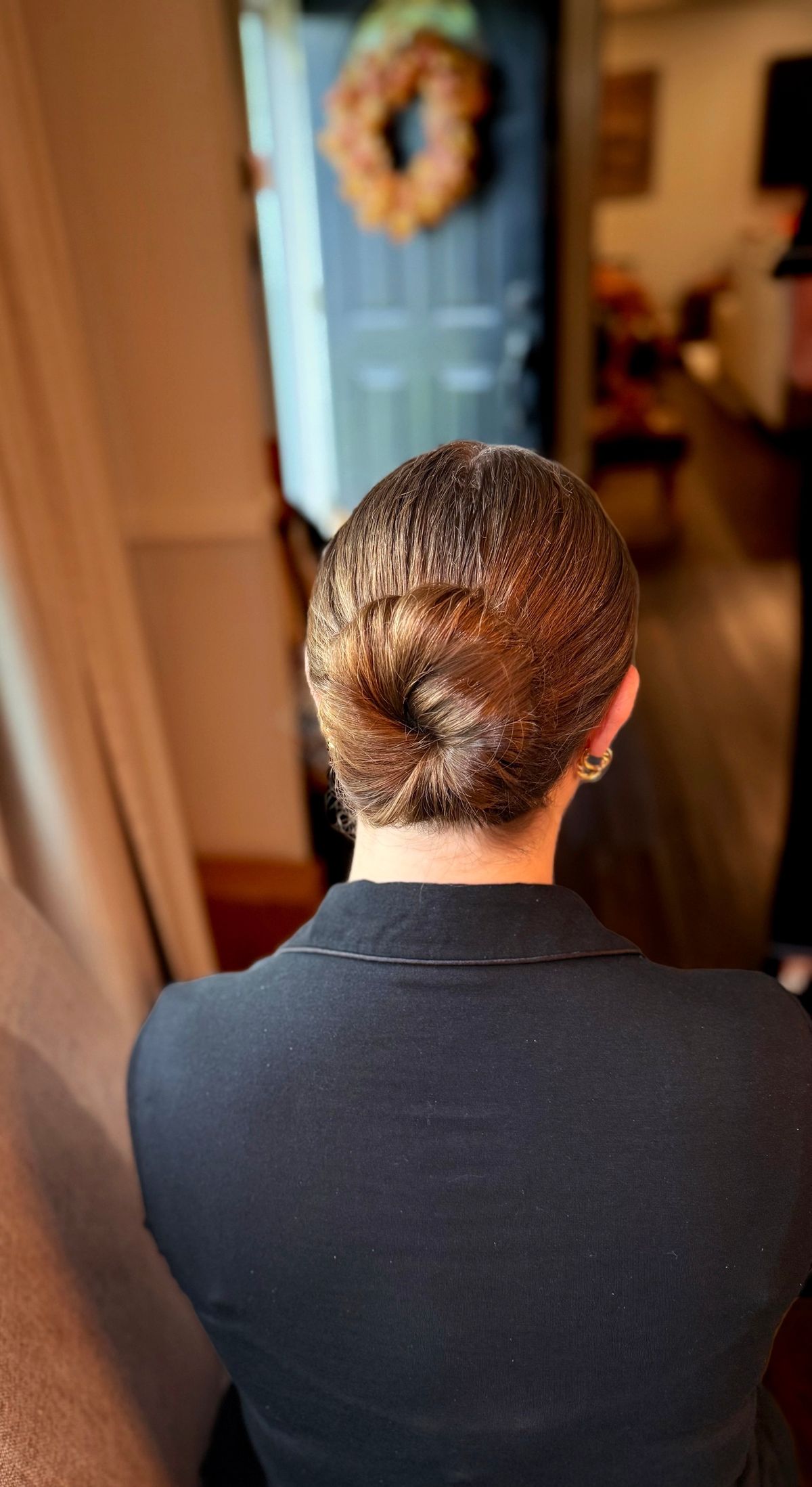 Sleek twisted chignon updo for formal events